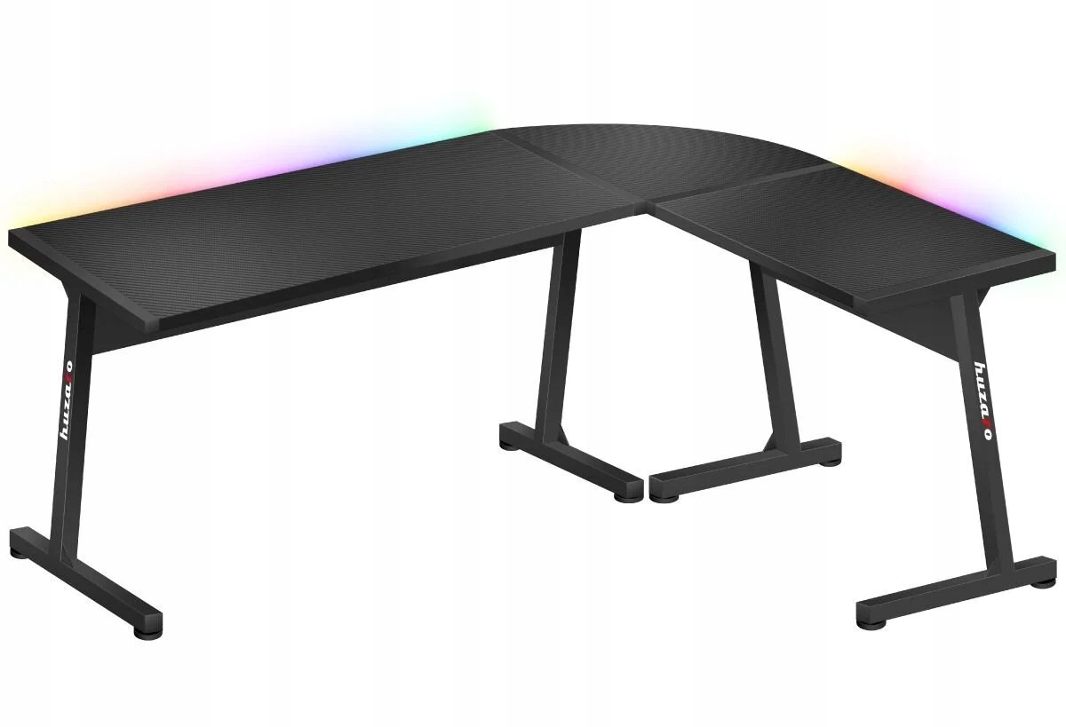 Rohový herný stôl Huzaro Hero 6.0 RGB, čierny. Stôl Huzaro Hero 6.0 RGB vytvorí pracovnú plochu v tvare L. Dlhšiu časť možno pri montáži umiestniť na ľavú alebo pravú stranu. Podsvietenie RGB po okrajoch dosky sa ovláda diaľkovým ovládačom alebo cez mobil
