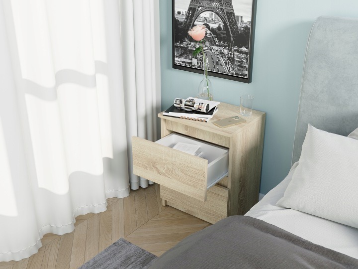 Framire R-2 – nočný stolík dub Sonoma s 2 zásuvkami, 40 × 30 × 52 cm. Stolík v dekore dub Sonoma vytvára pri posteli miesto na večerné drobnosti a dve zásuvky ich pomôžu odložiť mimo pohľadu. Bezúchytkové čelá zachovávajú jednoduchý vzhľad, ktorý môže spá