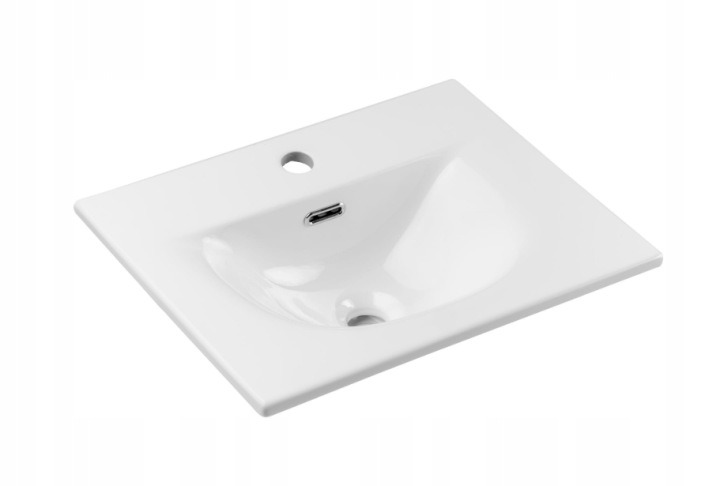 Kúpeľňová skrinka s umývadlom Comad Nova 50 cm. Súprava Comad Nova obsahuje 50 cm skrinku pod umývadlo a keramické umývadlo Sky. Skrinka má dve zásuvky s tichým dovieraním, matný dekor dub Coast Evoke a hĺbku približne 40 cm. Umývadlo meria 51 × 40 × 16 c