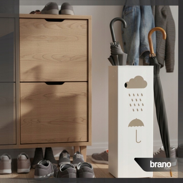 Biely stojan na dáždniky s dekorom oblaku, 16,5 × 16,5 × 42 cm. Stojan na dáždniky sústredí niekoľko modelov na jedno miesto pri vstupe do domácnosti. Výška 42 cm a štvorcový pôdorys 16,5 × 16,5 cm umožňujú naplánovať miesto vedľa skrinky alebo dverí. Po